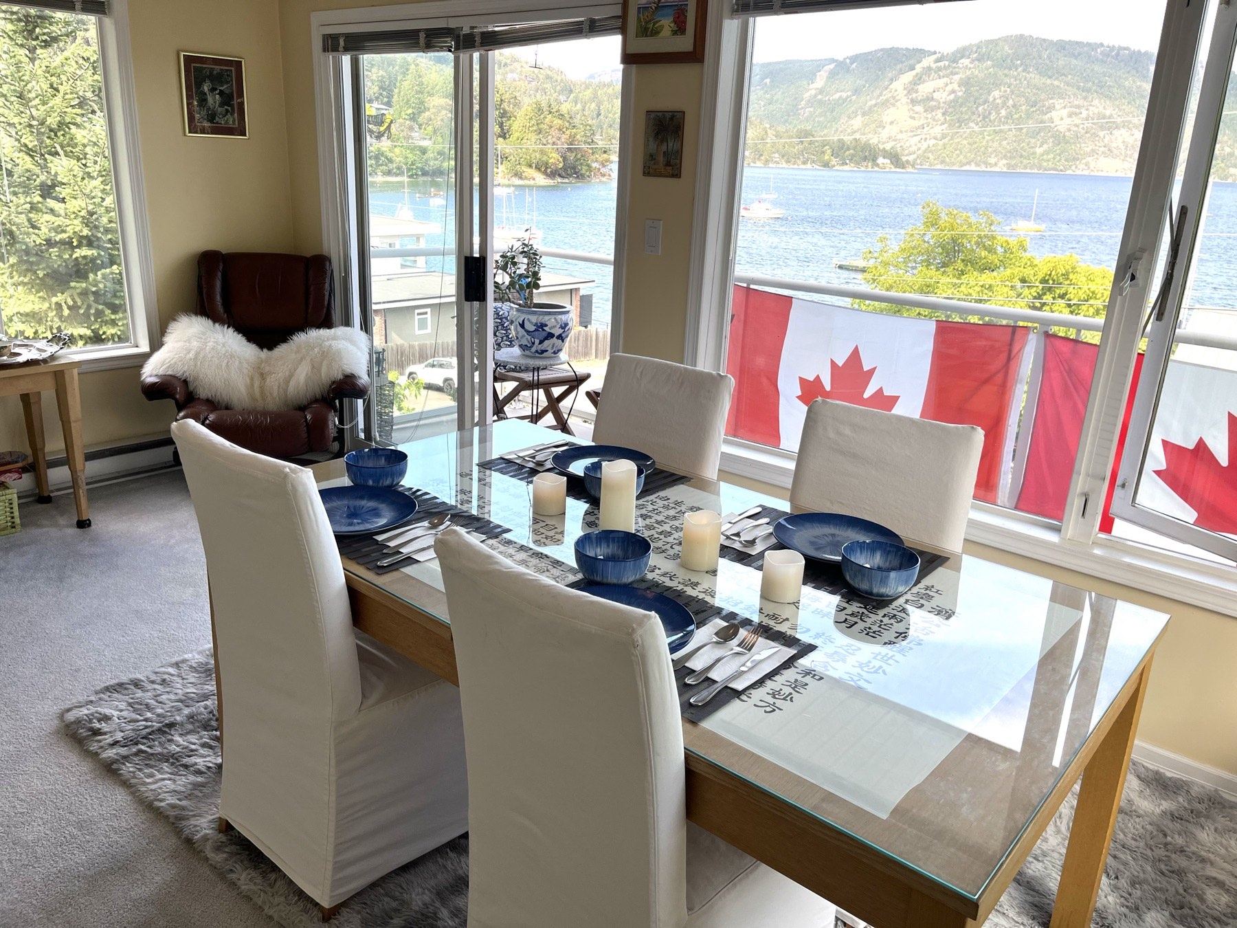 Dining table set for guests with ocean views
